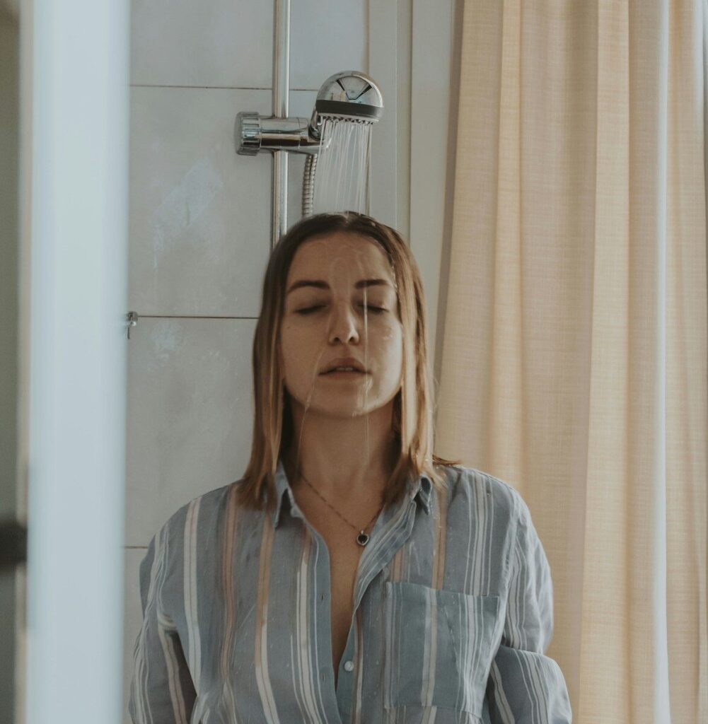 woman in blue and white stripe button up shirt